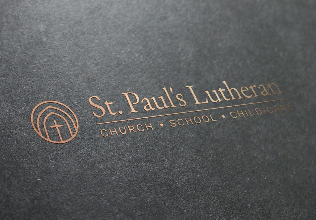 St. Paul's Lutheran logo and mark - embossed copper style on rough paper