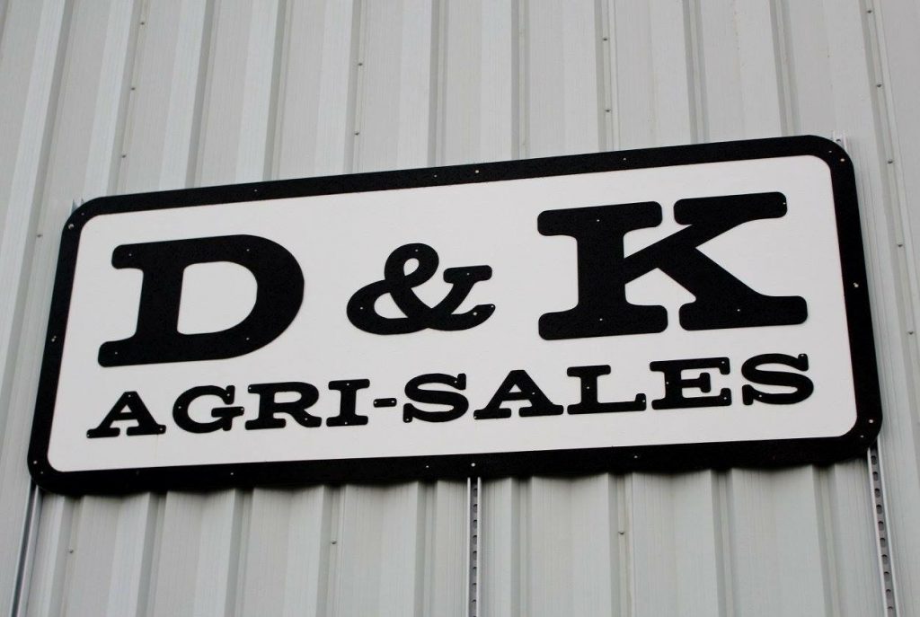 D&K agri-sales logo on a building sign